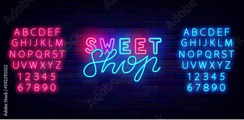 Sweet shop neon label. with lettering Candy bar logotype. Handwritten text. Glowing emblem. Vector stock illustration