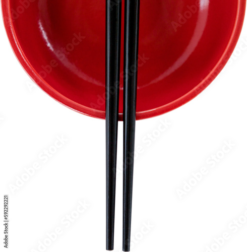 Close up of chopstick with red bowl