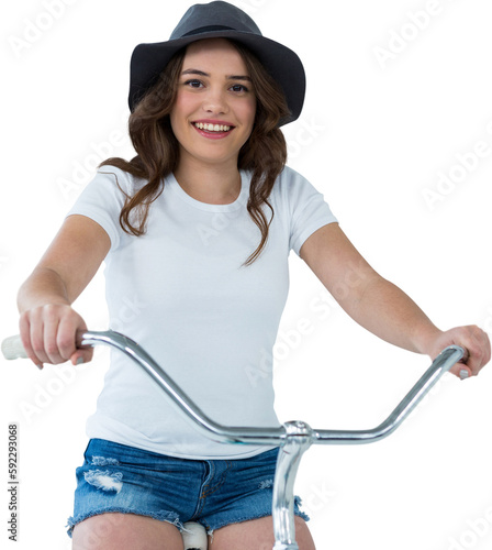 Portrait of happy woman cycling on bicycle