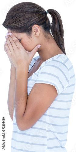 Side view of upset woman covering face