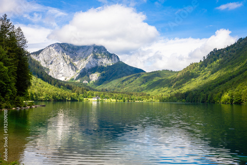 Beautiful view of a lake surrounded with mountains © Lichtwerkstatt Eu/Wirestock Creators