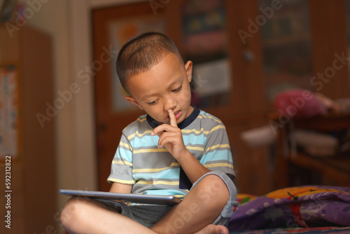 The boy used his hands to suck his nostrils.