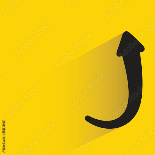turn up arrow with shadow on yellow background