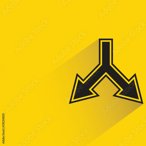 junction arrow with shadow on yellow background