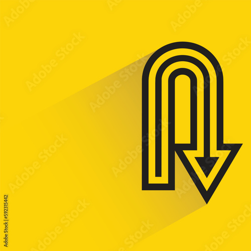 turn down arrow with shadow on yellow background