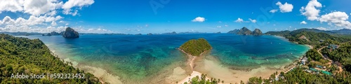 Drone panorama of the paradisiacal Maremegmeg beach near El Nido on the Philippine island of Palawan during the day