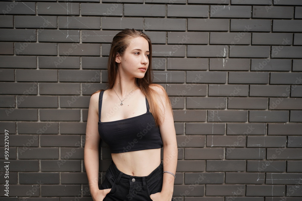 Stylish female teenager, Portrait of millennial young woman outdoors Stylish female teenager, Portrait of millennial young woman outdoors