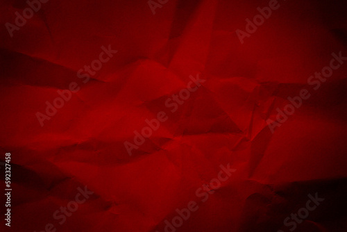 Crumpled red paper texture background. Wrinkled paper surface for designs.