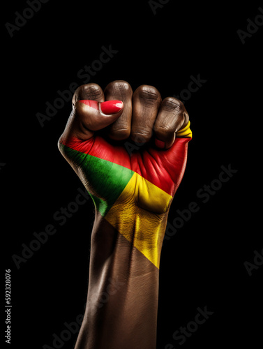 Fototapeta Juneteenth victorious hand with red, green, yellow overlay