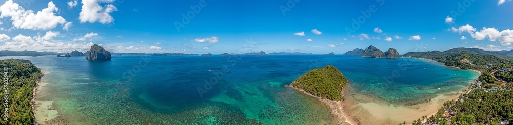 Drone panorama of the paradisiacal Maremegmeg beach near El Nido on the Philippine island of Palawan during the day Drone panorama of the paradisiacal Maremegmeg beach near El Nido on the Philippine island of Palawan during the day