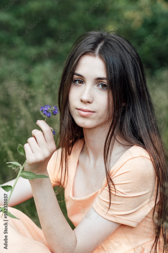 Feminine energy. Ways To Stay In Tune With Energy. Divine feminine energy or self love. Outdoors portrait of young woman enjoying nature