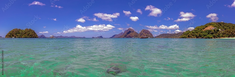 Impression of the paradisiacal Maremegmeg beach near El Nido on the Philippine island of Palawan during the day