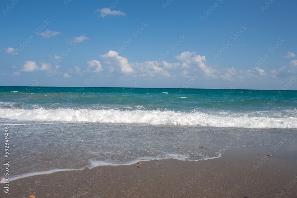 waves sand and sea. Nature landscape view of beautiful tropical beach and sea in sunny day. Beach sea space area