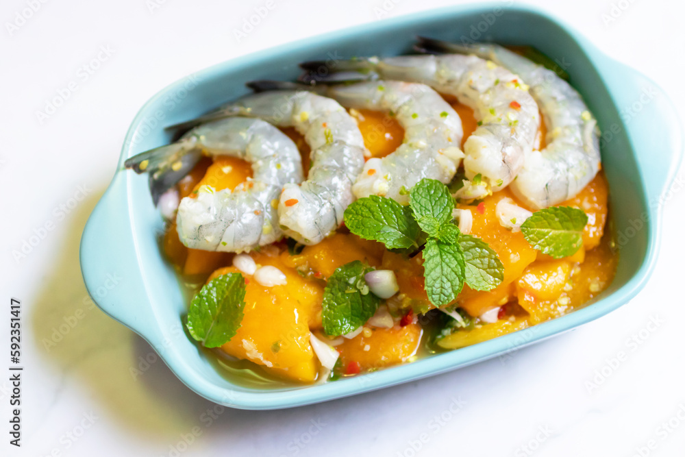 Marian plum Thai style spicy salad with pickled shrimp. Marian plum Thai style spicy salad with pickled shrimp.