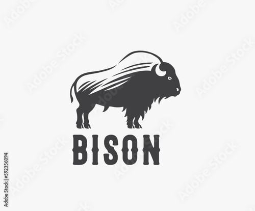 Symbol of the silhouette of a bison (bull), in the form of standing on his feet and looking forward. Vector illustration.