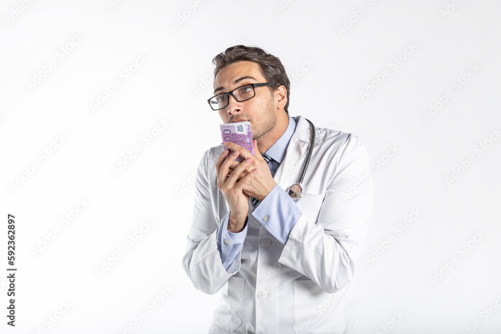 Funny and cunning doctor holding and sniffing pack of money isolated on white background. Corruption and bribe concept Funny and cunning doctor holding and sniffing pack of money isolated on white background. Corruption and bribe concept