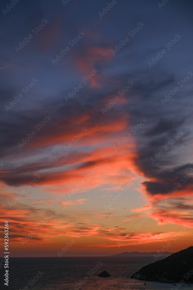 Beautiful view of clouds in the sky during an orange sunset