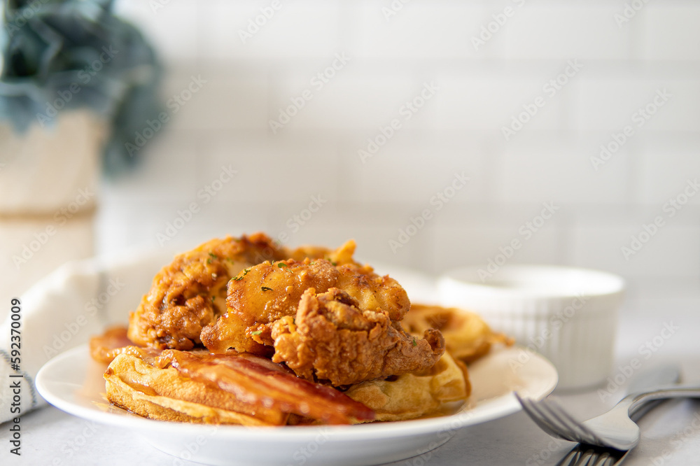 chicken and waffles on a plate with flower background chicken and waffles on a plate with flower background