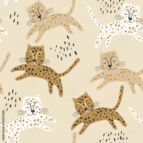 Seamless childish jungle pattern with cartoon leopards. Perfect for fabric,textile. Creative Vector background