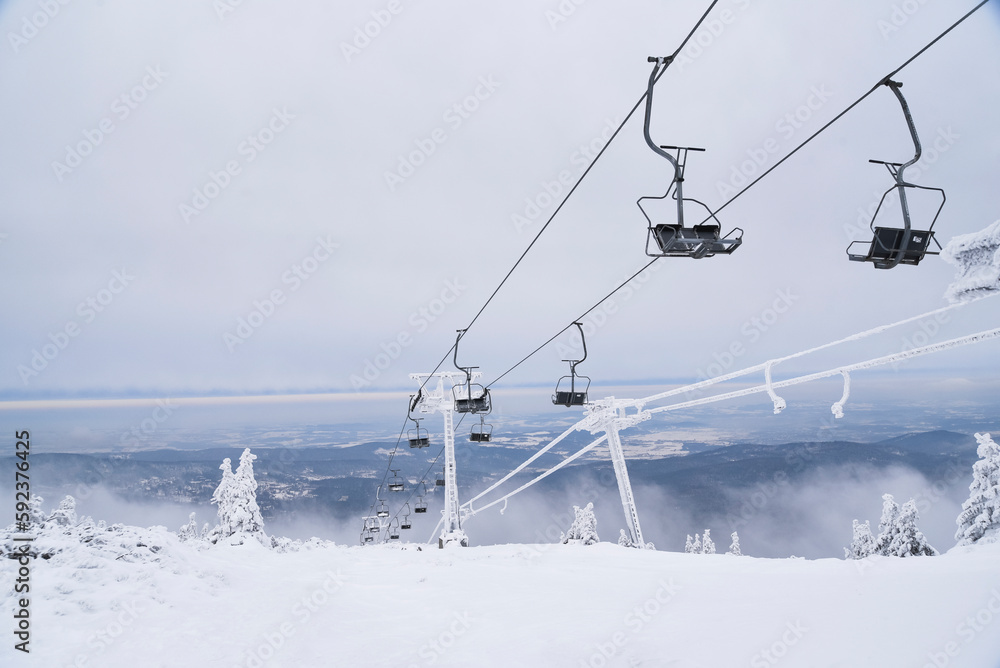 .Chair on the ski lift in winter in the mountains. .Chair on the ski lift in winter in the mountains.