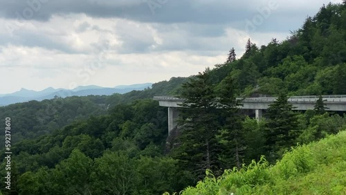 Blue Ridge Parkway and the Linn Cove Viaduct hugging the face of Grandfather Mountain, recognized internationally as an engineering marvel protecting the fragile habitat of area. 