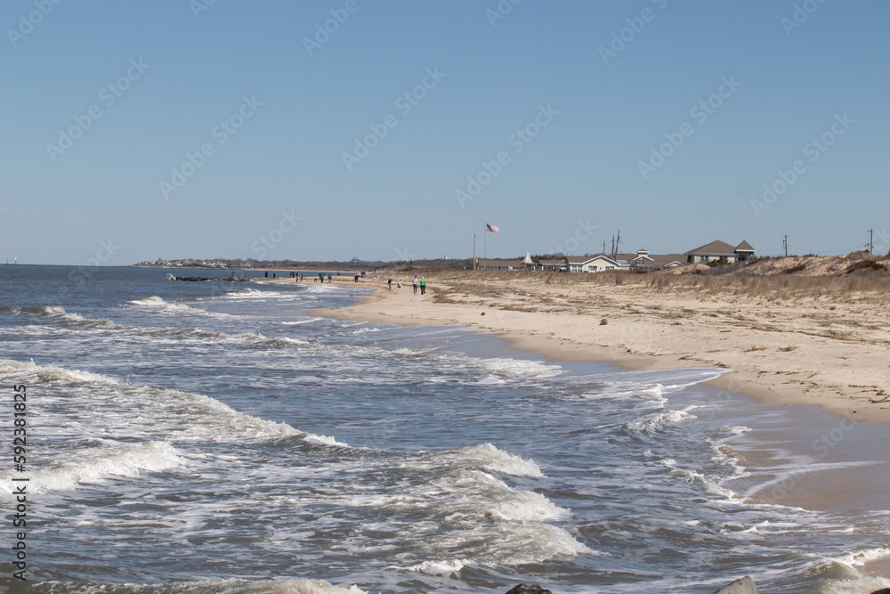 I loved the look of this beautiful beach scene. with pretty sand dunes. The water pummeling the shore with looks of rough seas. Whitecaps rippling through with pretty blue skies.