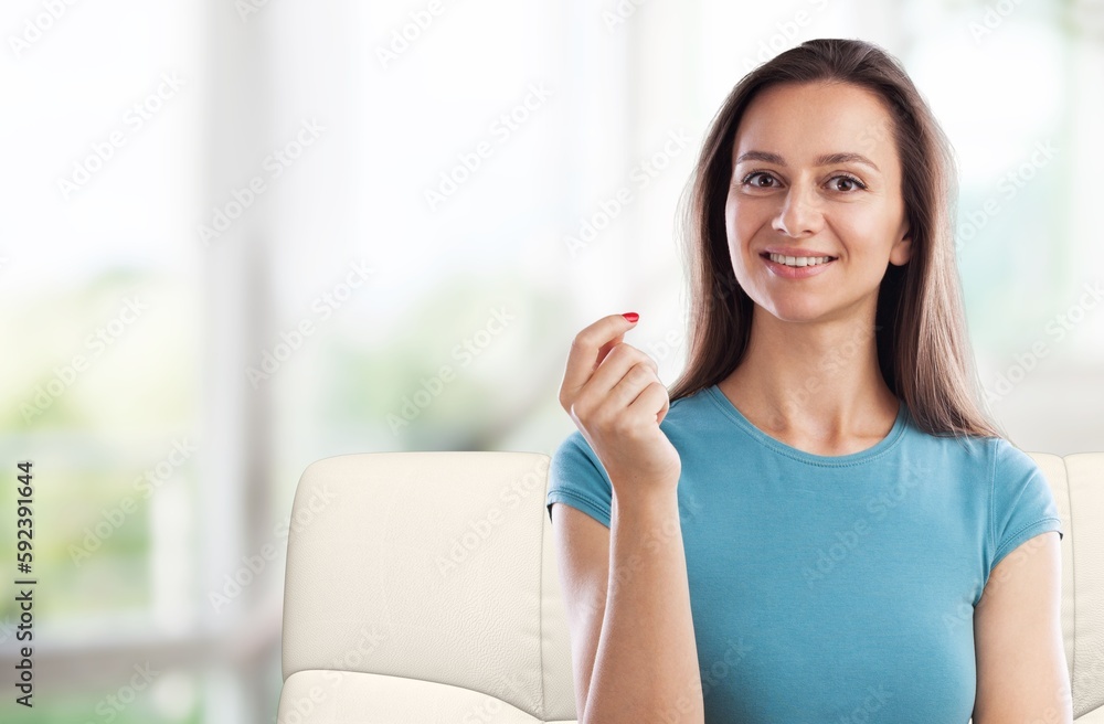 young attractive woman relaxing at home