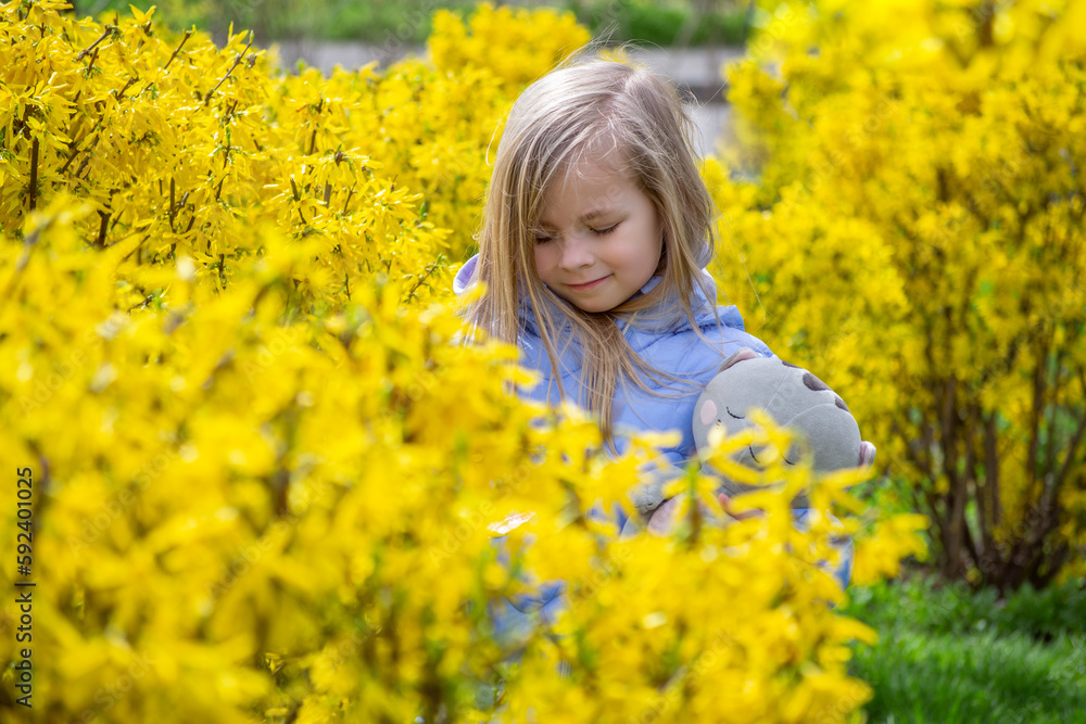 little girl in a field of dandelions little girl in a field of dandelions