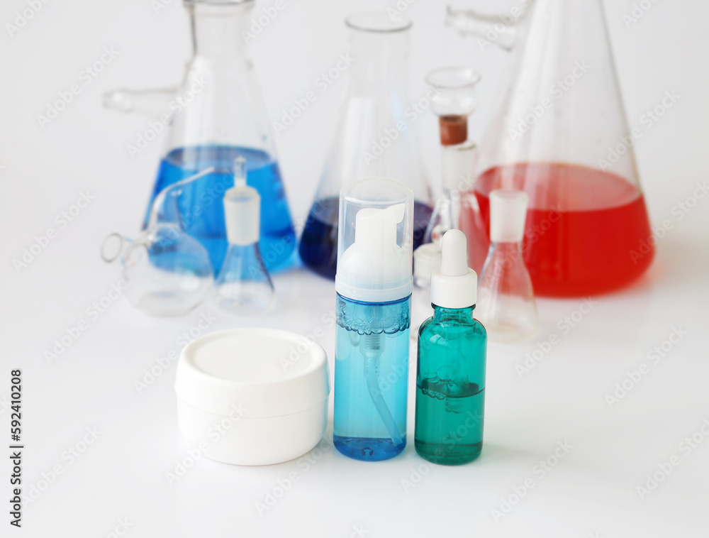 skin serum, moisturizing and whitening serum, fruit acids.Glass Volumetric Flask ,Laboratory Flasksare used for laboratory work in the background skin serum, moisturizing and whitening serum, fruit acids.Glass Volumetric Flask ,Laboratory Flasksare used for laboratory work in the background
