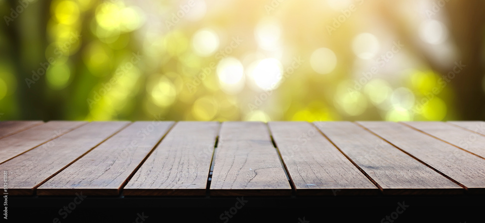 empty wooden table with a spring green background - copy space empty wooden table with a spring green background - copy space