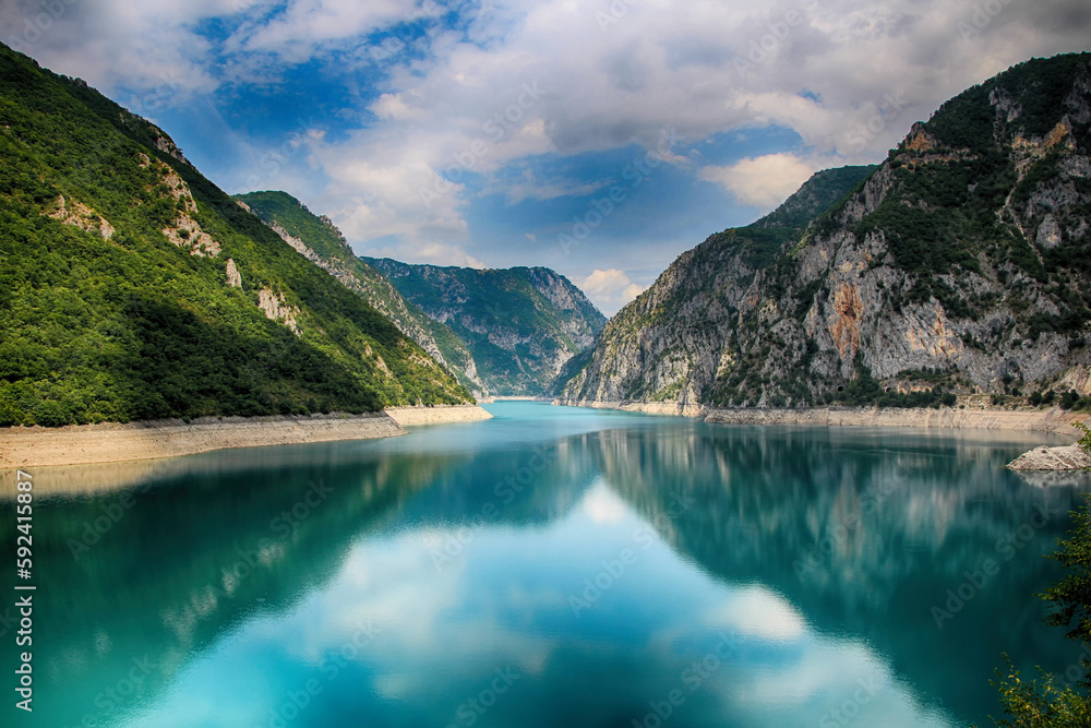 
reflection of nature on water, lake scenery with mountains beautiful view