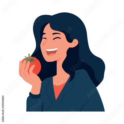 Smiling women holding fresh organic vegetables happily