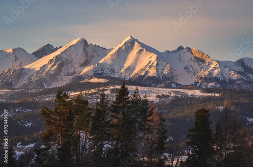 Charming panorama of the Polish Tatra Mountains in the morning. View of the Belianske Tatras from the village of Lapszanka, Poland.