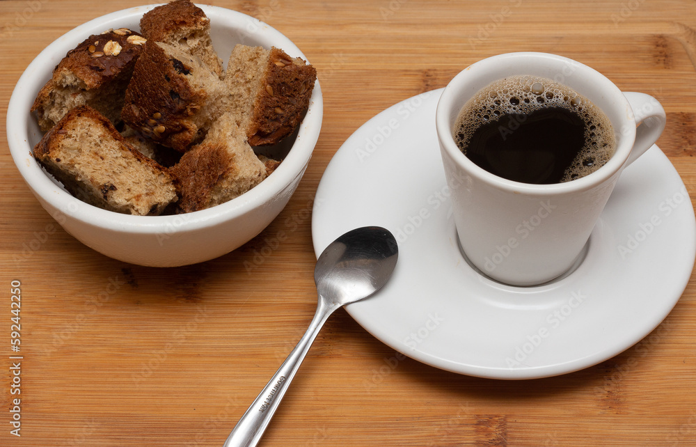 coffee cup with bowl full of toast coffee cup with bowl full of toast
