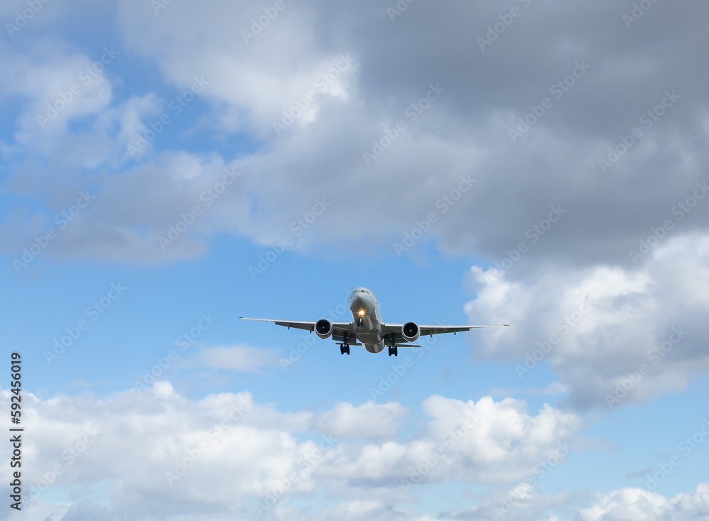 The passenger plane is landing. The passenger plane is landing.
