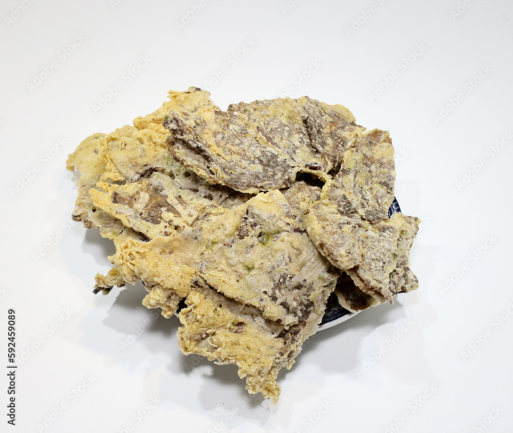 Keripik Paru, a typical Indonesian snack made from beef lung mixed with flour and then fried Keripik Paru, a typical Indonesian snack made from beef lung mixed with flour and then fried