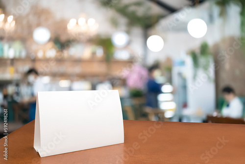 Wallpaper Mural Blank menu frame label mockup. Mock up menu frame on table in bar restaurant, stand for booklet with white sheet of acrylic tent card paper in blur cafeteria Torontodigital.ca
