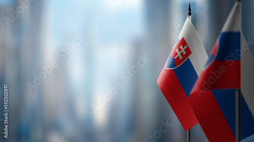 Photography Small flags of the Slovakia on an abstract blurry background