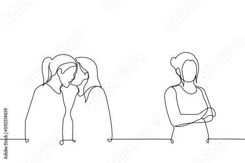 two female friends are discussing whispering in each other's ear, a lonely woman stands apart from them with her arms crossed - one line drawing vector. concept of discussing, envy, boycott, foe