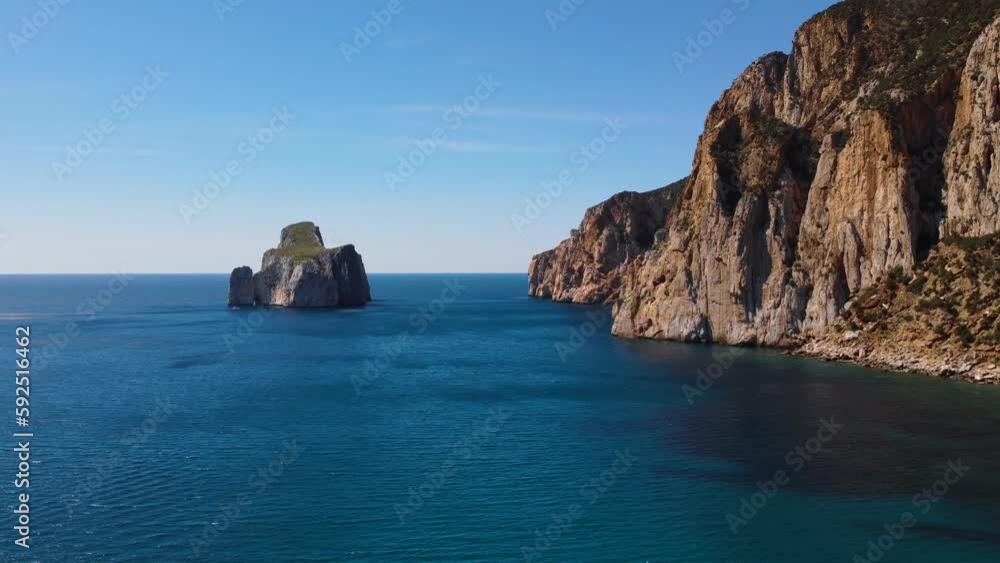 Amazing drone aerial of Masua coast in South Sardinia, sunny day, dolly out Amazing drone aerial of Masua coast in South Sardinia, sunny day, dolly out