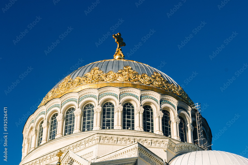 The dome of the Naval Cathedral against the background of the sky in Kronstadt, St. Petersburg, Russia