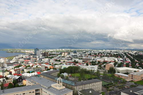 Aerial view of colorful buildings and lush greenery of Reykjavik, Iceland © codebude