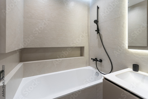 Bright elegant bathroom interior in a luxury house