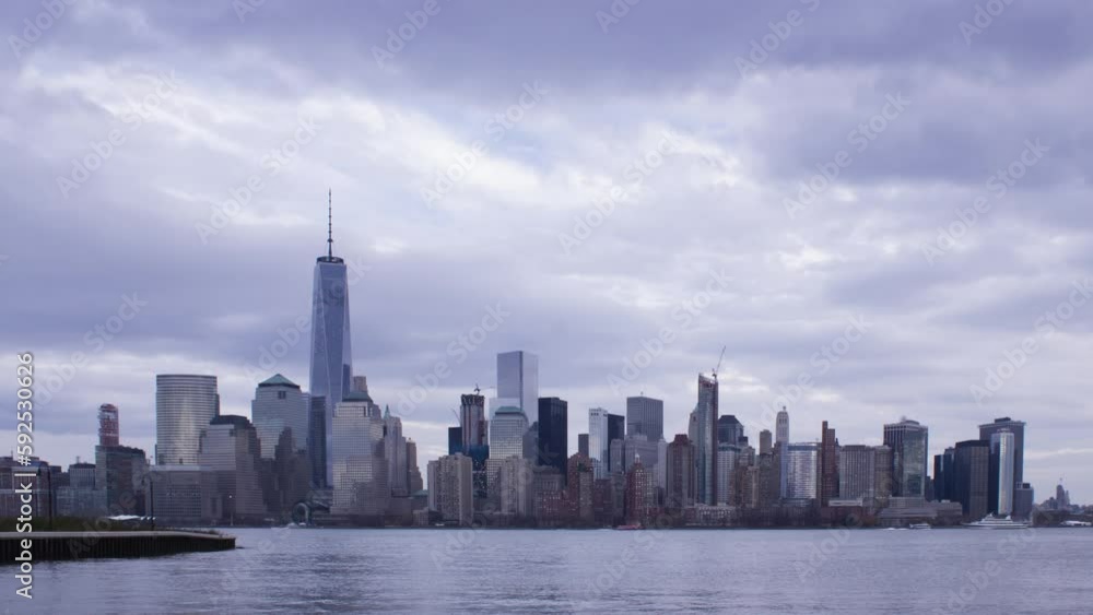 Timelapse skyline New York on a cloudy day, metropolis cityscape, ships movement Timelapse skyline New York on a cloudy day, metropolis cityscape, ships movement