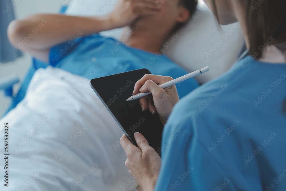 Injured patient showing doctor broken wrist and arm with bandage in hospital office or emergency room. Sprain, stress fracture or repetitive strain injury in hand. Nurse helping customer. First aid. Injured patient showing doctor broken wrist and arm with bandage in hospital office or emergency room. Sprain, stress fracture or repetitive strain injury in hand. Nurse helping customer. First aid.