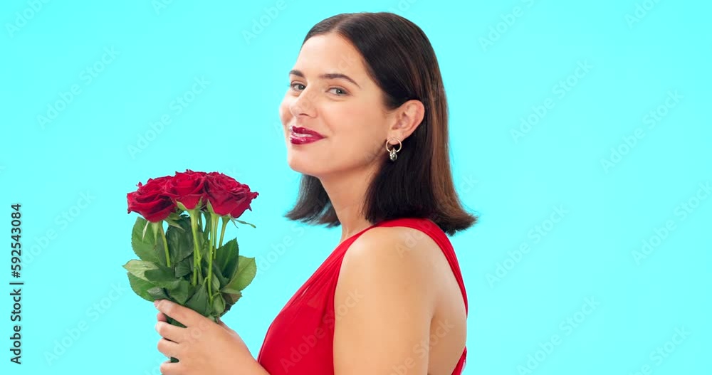 Rose, smell and face of woman in studio with floral bouquet in celebration of love, romance or valentines day. Portrait, scent and girl happy, smile and excited for flowers against blue background Rose, smell and face of woman in studio with floral bouquet in celebration of love, romance or valentines day. Portrait, scent and girl happy, smile and excited for flowers against blue background