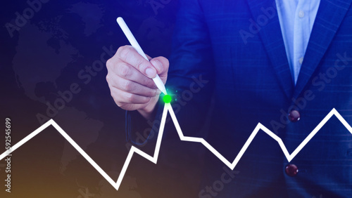 Businessman drawing growth curve, growth forecast chart, bussiness success concept. Hand drawing a graph representing increasing profits.