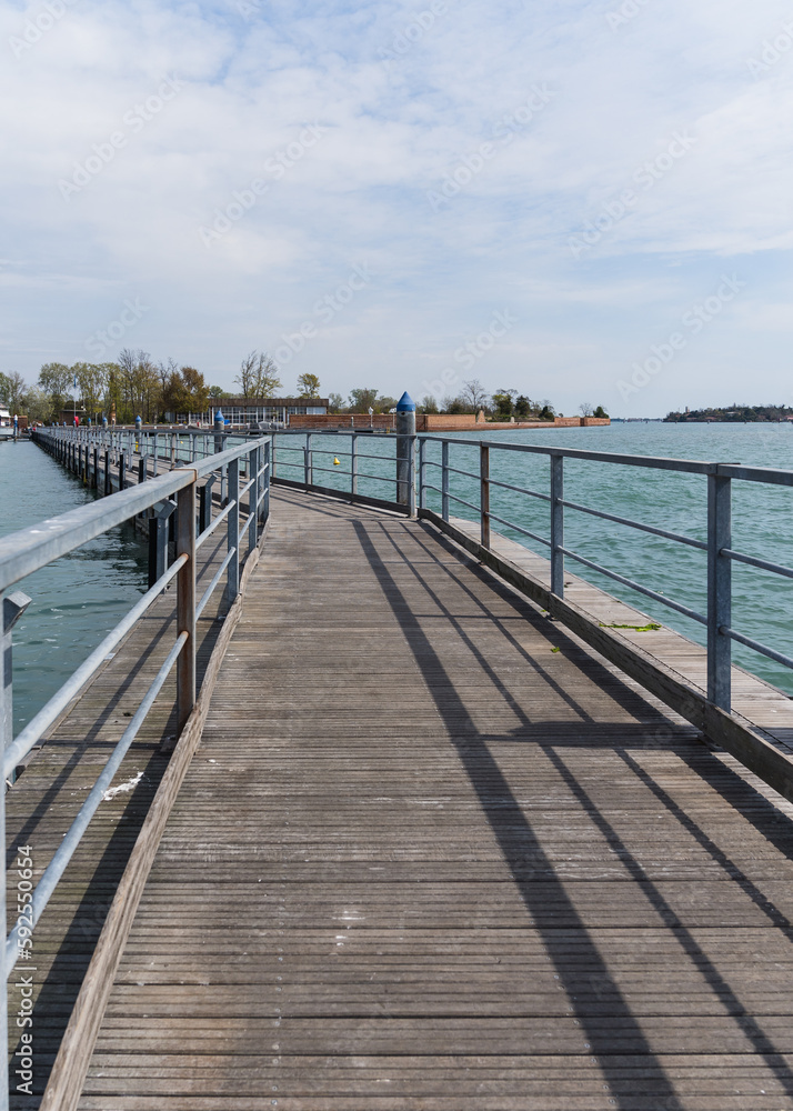 Long pontoon suspended bridge In Venice, Italy