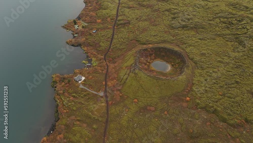 Sandey volcanic crater island in lake Thingvallavatn in the south of Iceland photo