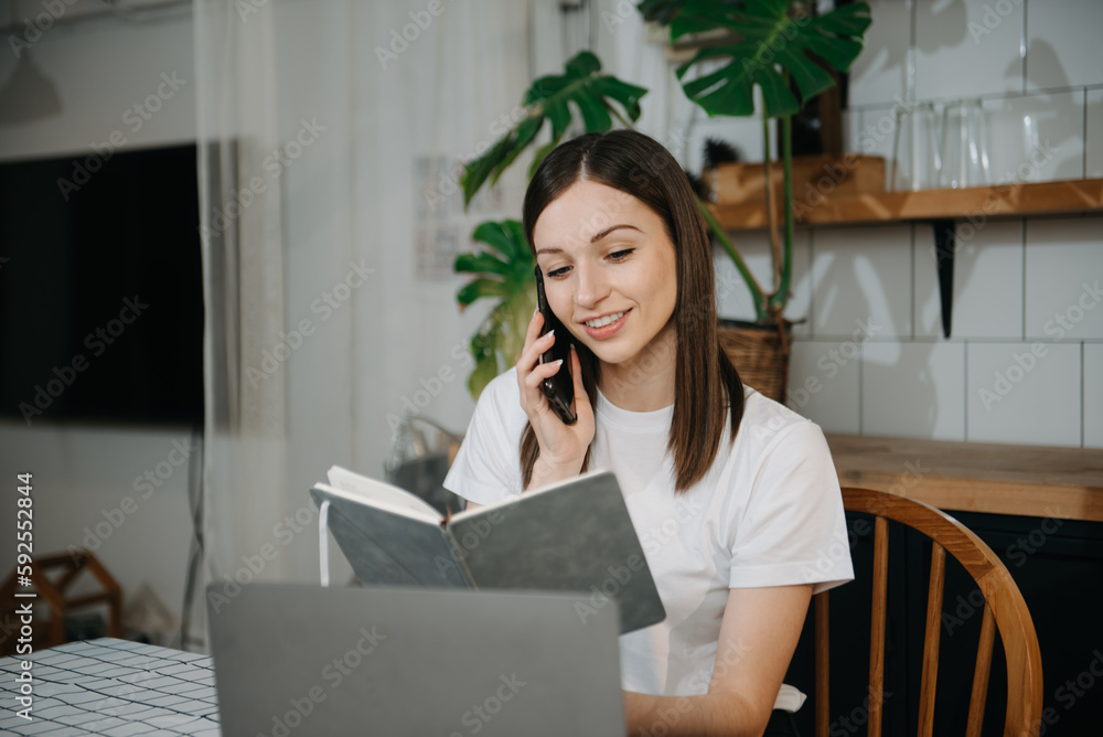 Business woman using tablet and laptop for doing math finance on an office desk, tax, report, accounting, statistics, and analytical research concept Business woman using tablet and laptop for doing math finance on an office desk, tax, report, accounting, statistics, and analytical research concept